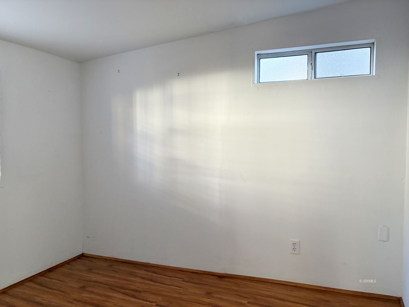 25955 Highway 243, Unit 25 Idyllwild, CA 92549 - Photo 26 of 38 a view of a small space with wooden floor and a window