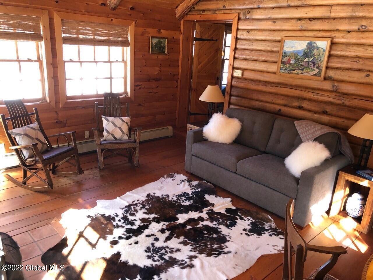 175 Henry Wescott Road Thurman, NY 12885 - Photo 23 of 55 Dean's study with sleeper sofa