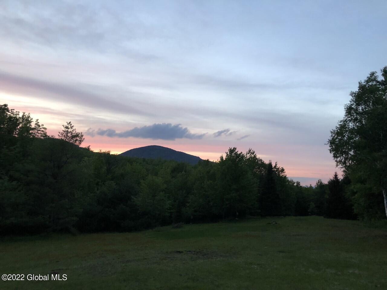 175 Henry Wescott Road Thurman, NY 12885 - Photo 54 of 55 sunset over the mountain