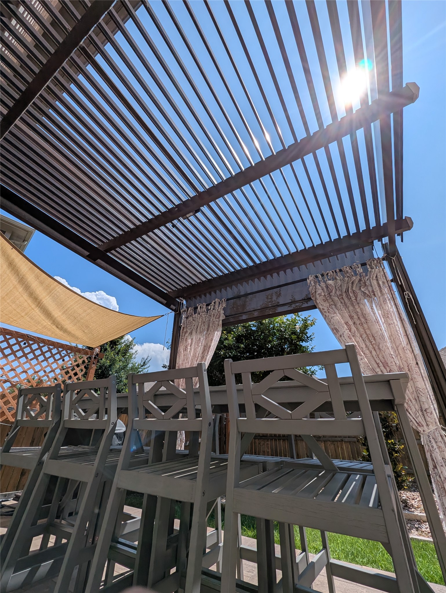 14502 McCoy Loop Austin, TX 78717 - Photo 26 of 26 Exterior patio featuring a modern slatted pergola roof system