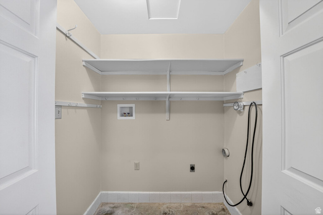 3120 North Apache Way Provo, UT 84604 - Photo 30 of 58 Dedicated utility room featuring two levels of built-in shelving, plumbing hookups, electrical outlets, and a tiled floor border