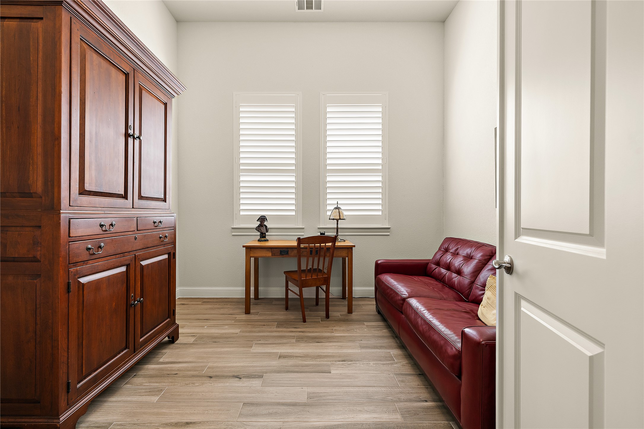 1716 Siena Sunset Road Leander, TX 78641 - Photo 8 of 28 There's a dedicated office space so the bedrooms can stay bedrooms.