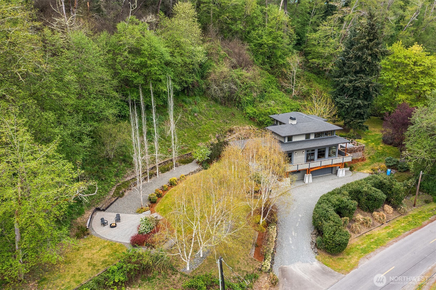 8302 Southwest Dilworth Road Vashon, WA 98070 - Photo 36 of 40 an aerial view of a house with a garden and lake view