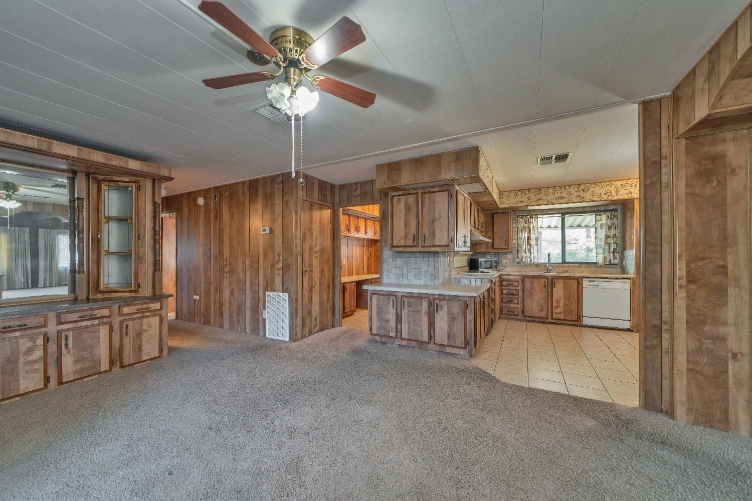 4420 Pleasant Valley Road, Unit 116 Diamond Springs, CA 95619 - Photo 12 of 28 a view of a livingroom with furniture and windows