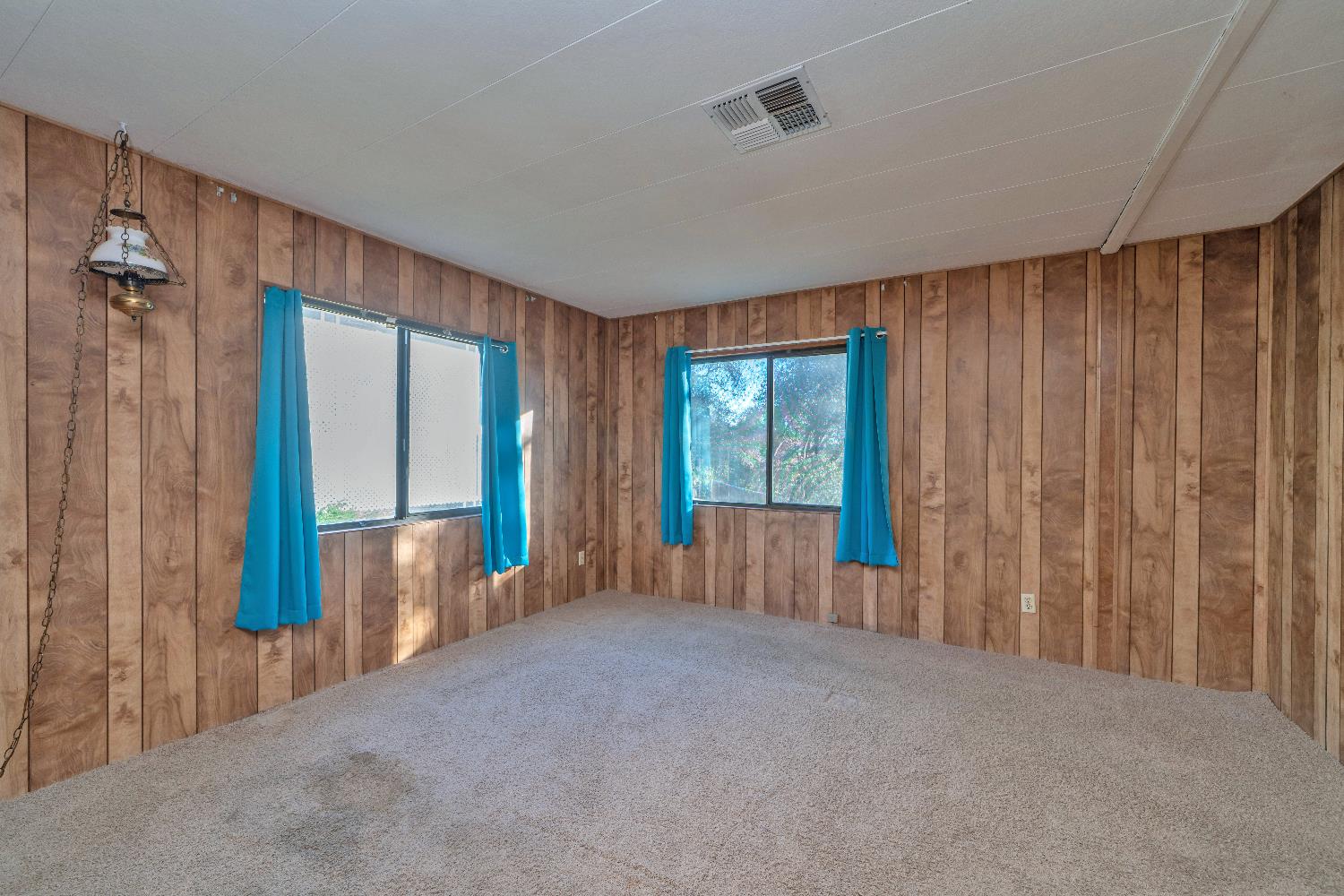 4420 Pleasant Valley Road, Unit 116 Diamond Springs, CA 95619 - Photo 14 of 28 a view of an empty room with a window