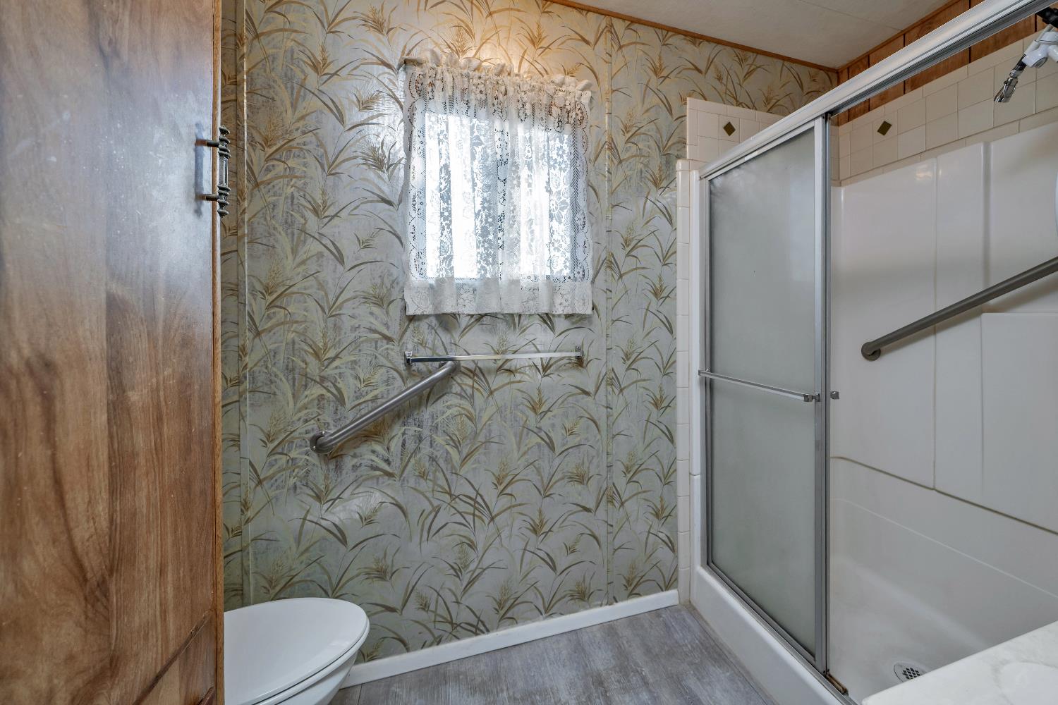 4420 Pleasant Valley Road, Unit 116 Diamond Springs, CA 95619 - Photo 19 of 28 a bathroom with a shower and a toilet