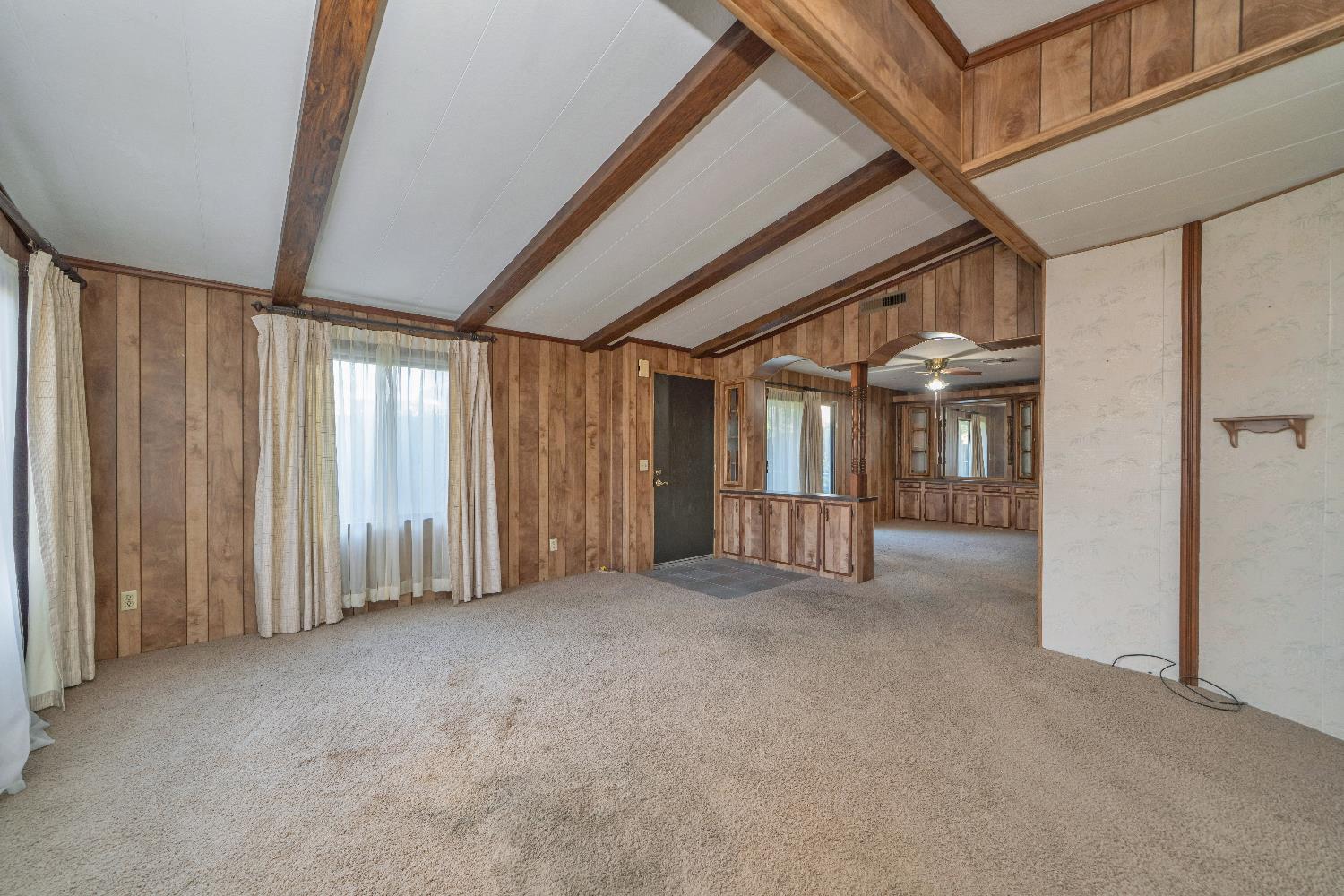 4420 Pleasant Valley Road, Unit 116 Diamond Springs, CA 95619 - Photo 5 of 28 an empty room with windows