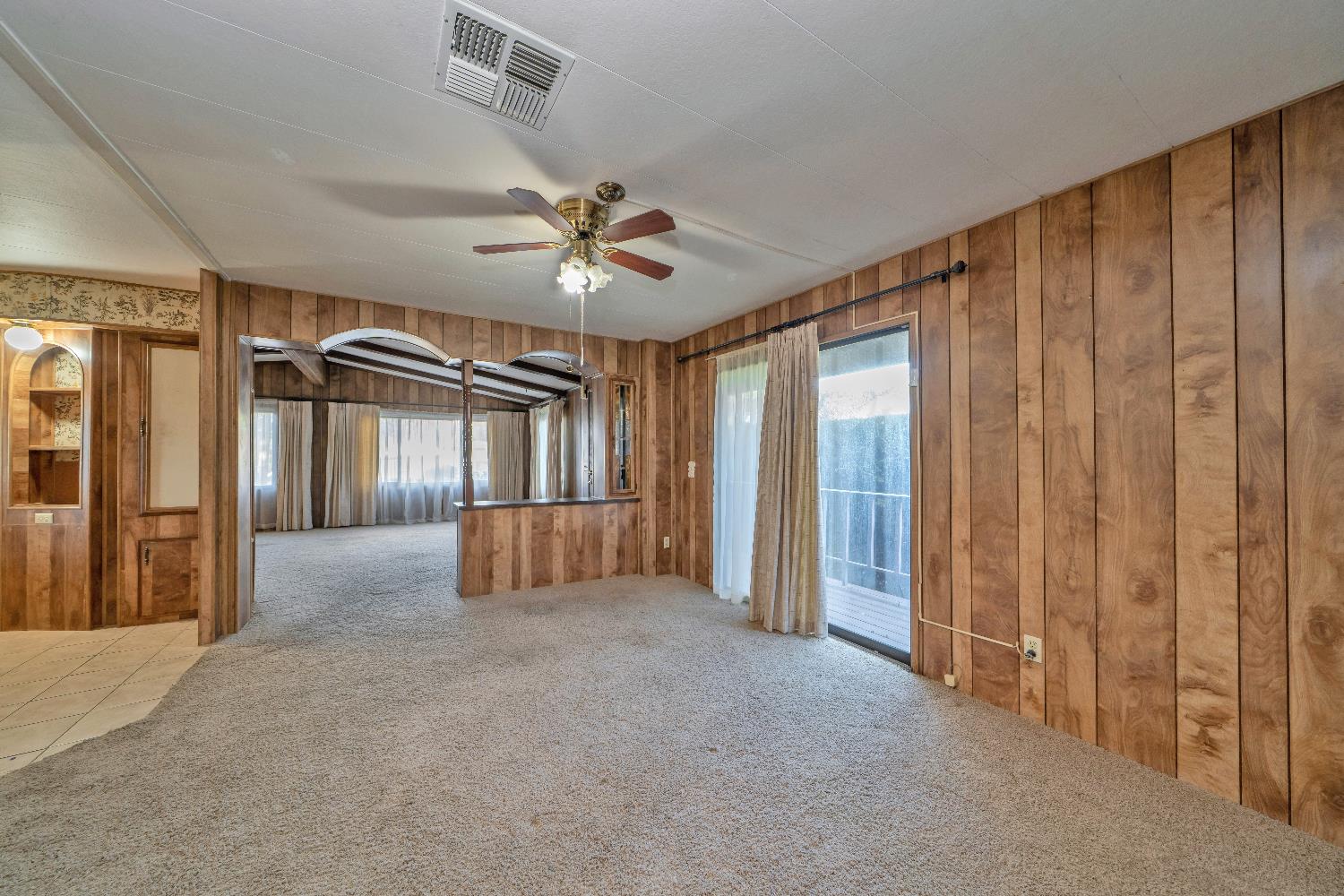 4420 Pleasant Valley Road, Unit 116 Diamond Springs, CA 95619 - Photo 10 of 28 a view of an empty room with a window