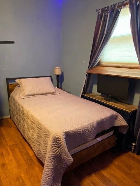 213 Crawford Run Road Creighton, PA 15030 - Photo 12 of 15 a bed sitting in a bedroom next to a window