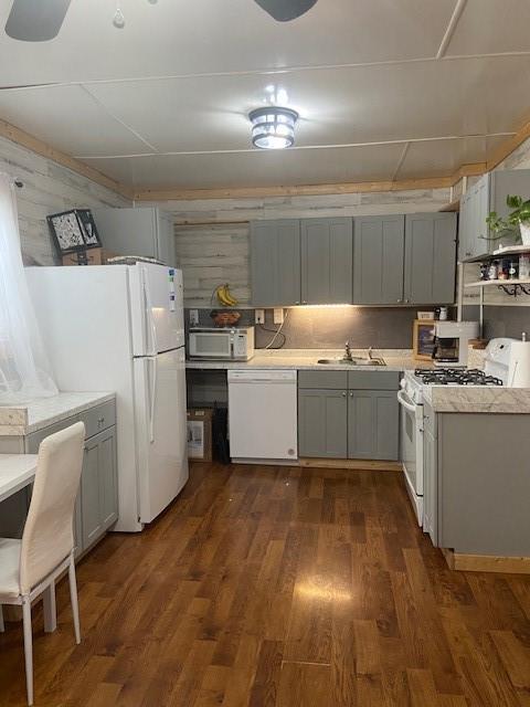 213 Crawford Run Road Creighton, PA 15030 - Photo 5 of 15 a kitchen with a sink a refrigerator and chairs