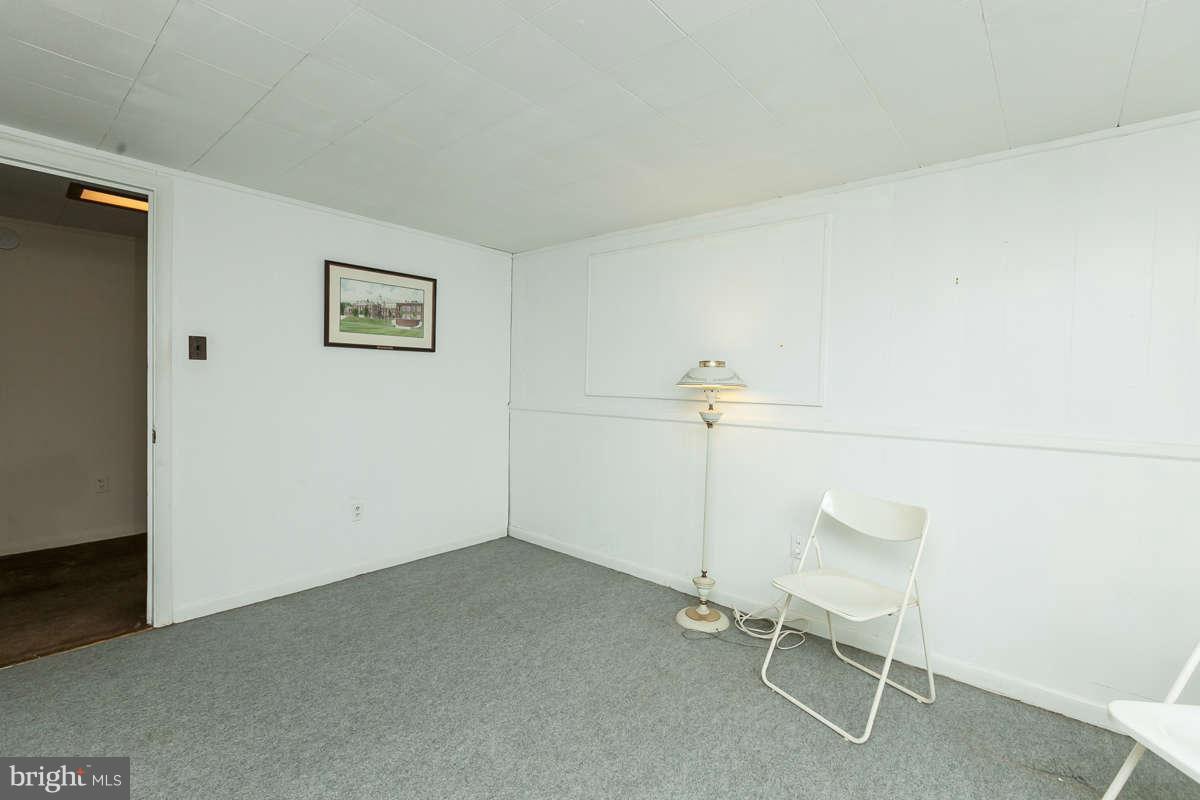 1331 Heather Hill Road Baltimore, MD 21239 - Photo 16 of 28 a view of a room with table and chair