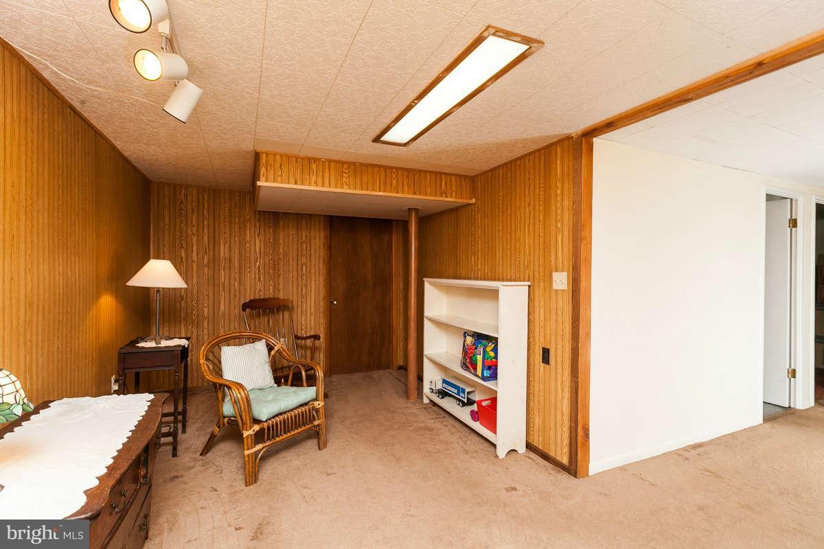 1331 Heather Hill Road Baltimore, MD 21239 - Photo 17 of 28 a view of a room with gym equipment