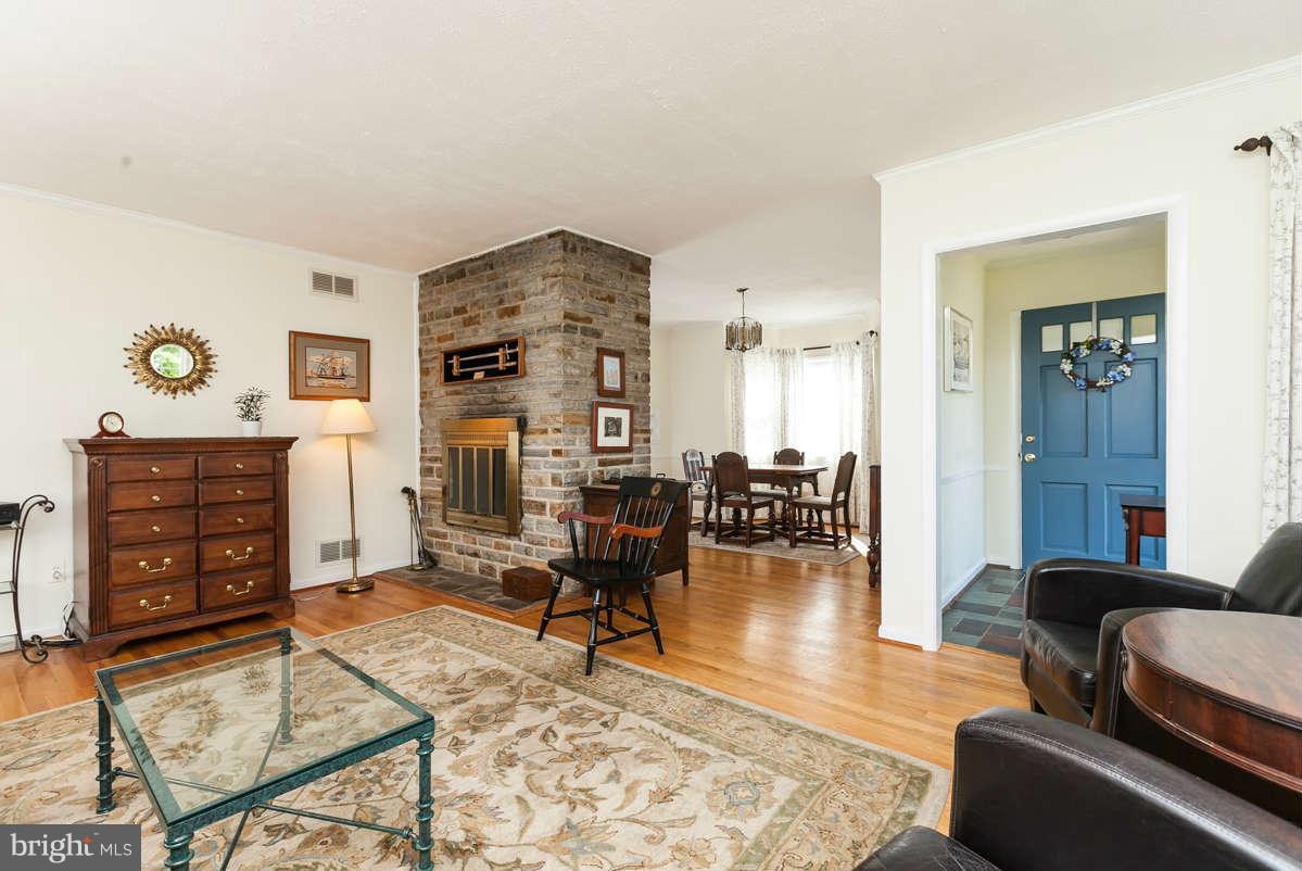 1331 Heather Hill Road Baltimore, MD 21239 - Photo 3 of 28 a living room with furniture and wooden floor