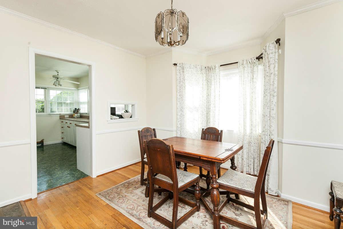 1331 Heather Hill Road Baltimore, MD 21239 - Photo 8 of 28 a view of a dining room with furniture and window