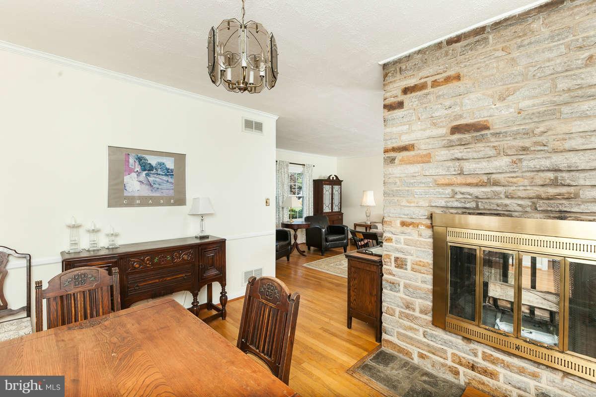 1331 Heather Hill Road Baltimore, MD 21239 - Photo 9 of 28 a very nice looking living room with a large window