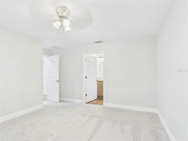 an empty room with a bathroom
