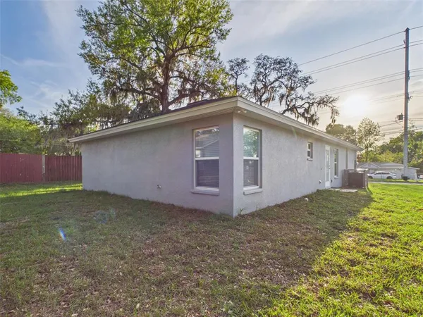 a house with trees in front of it