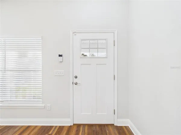 a view of a room that has a window in it