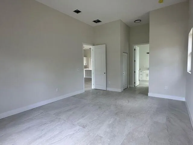 an empty room with windows