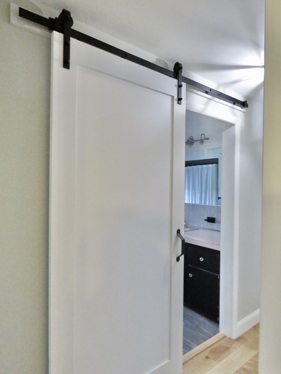 12 Sawmill Road Dudley, MA 01571 - Photo 23 of 37 a bathroom with a shower and a sink