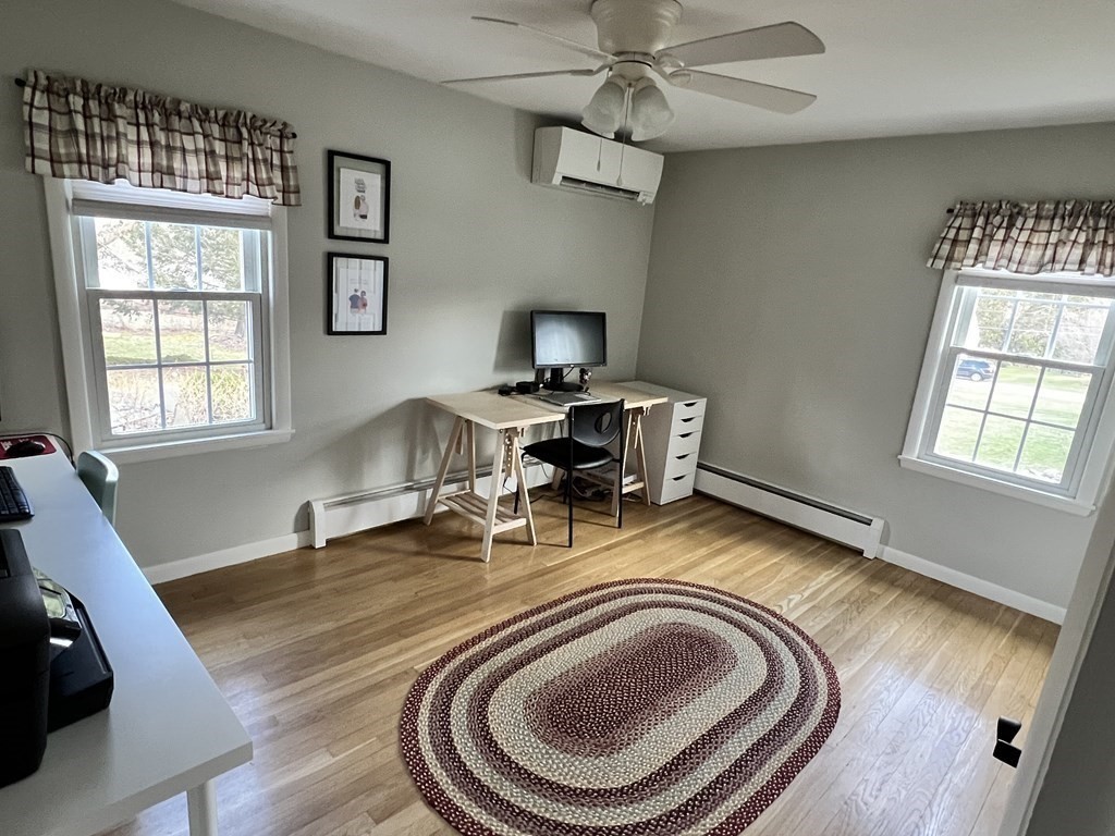 12 Sawmill Road Dudley, MA 01571 - Photo 28 of 37 a room with furniture and a wooden floor