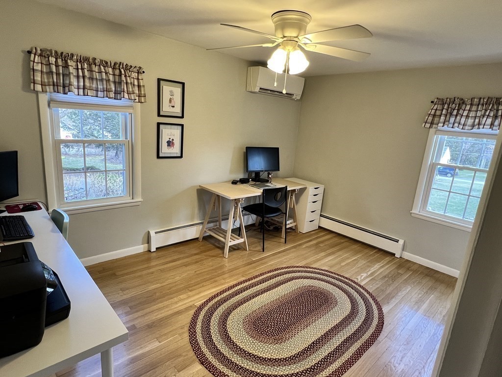 12 Sawmill Road Dudley, MA 01571 - Photo 29 of 37 a view of a livingroom with furniture a chandelier