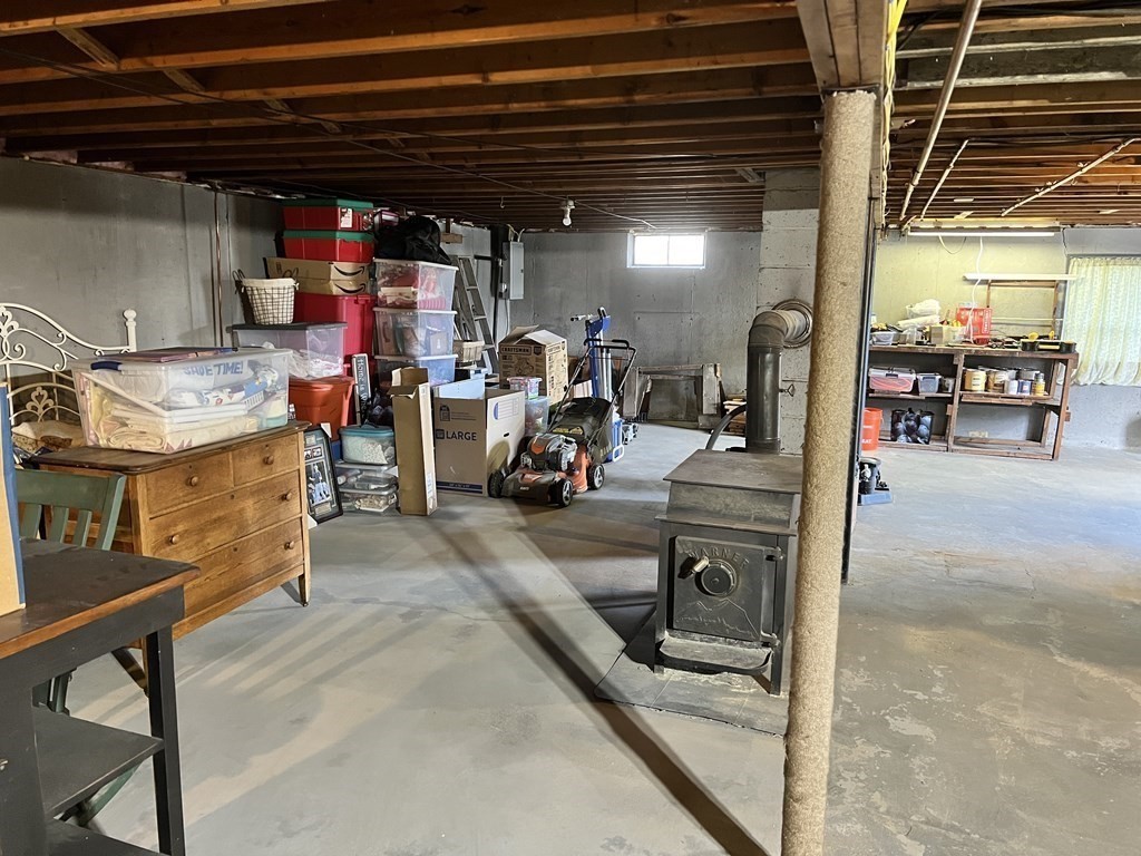 12 Sawmill Road Dudley, MA 01571 - Photo 33 of 37 a view of a storage room with furniture