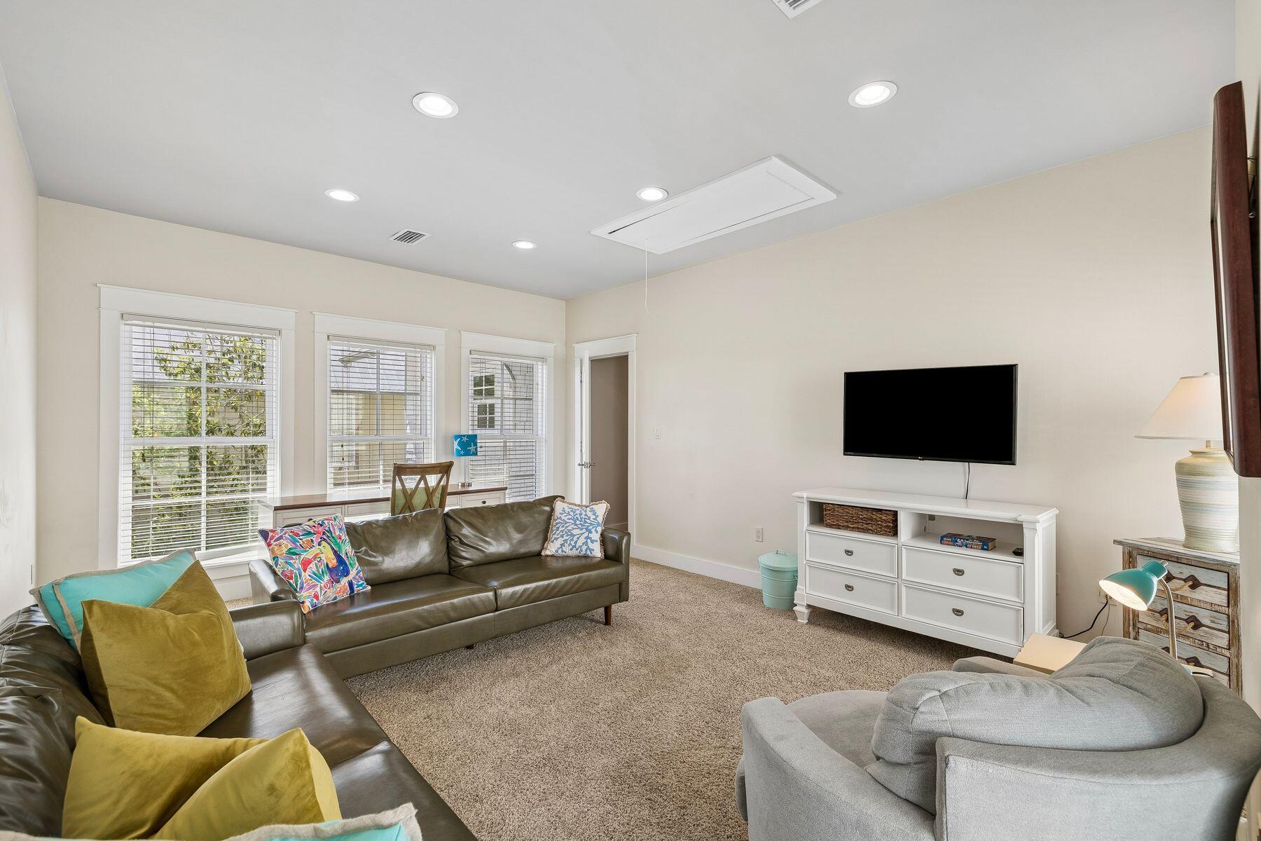 39 Willow Mist Road Inlet Beach, FL 32461 - Photo 24 of 41 a living room with furniture and a flat screen tv