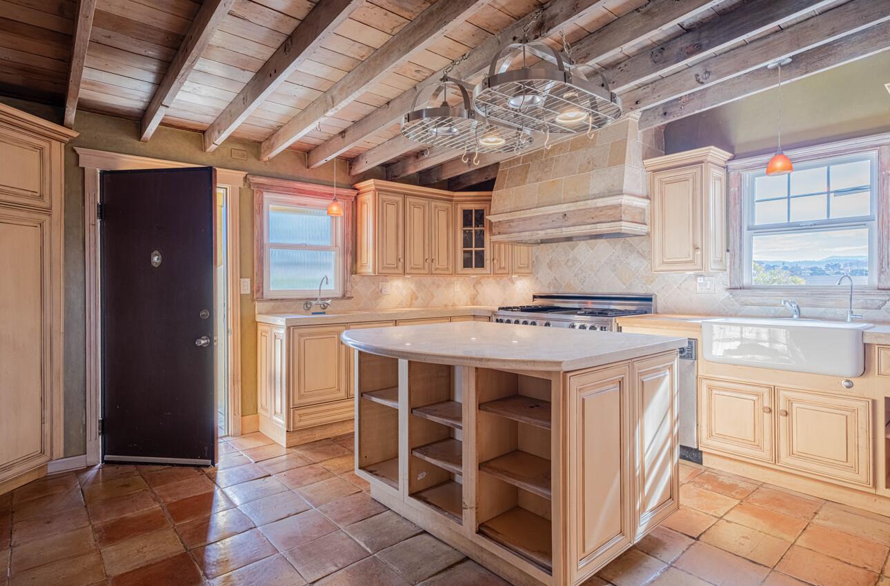 1800 Luxton Street Seaside, CA 93955 - Photo 11 of 48 a kitchen with stainless steel appliances granite countertop a stove and a sink