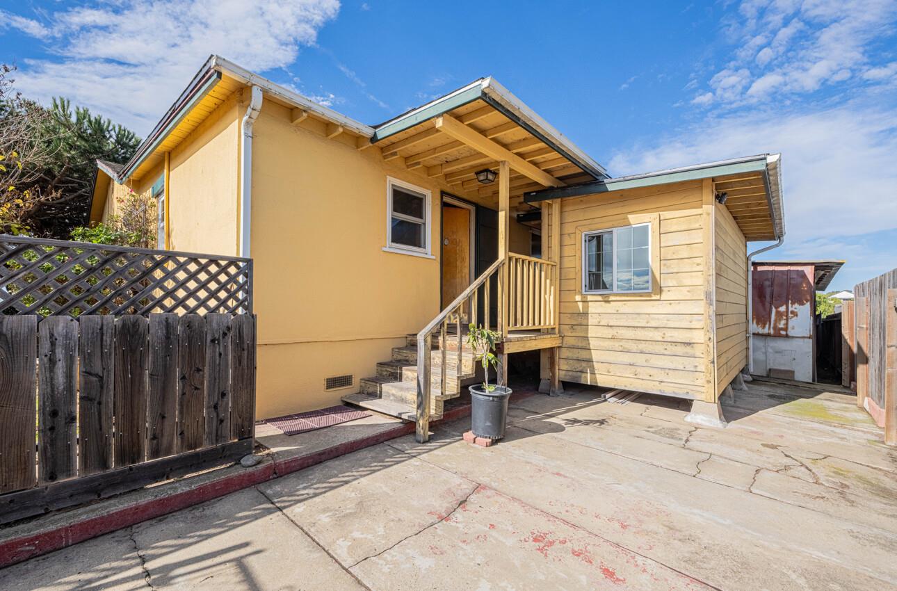1800 Luxton Street Seaside, CA 93955 - Photo 12 of 48 a view of a house with wooden fence