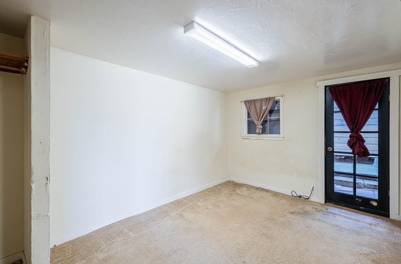 1800 Luxton Street Seaside, CA 93955 - Photo 32 of 48 an empty room with closet and windows