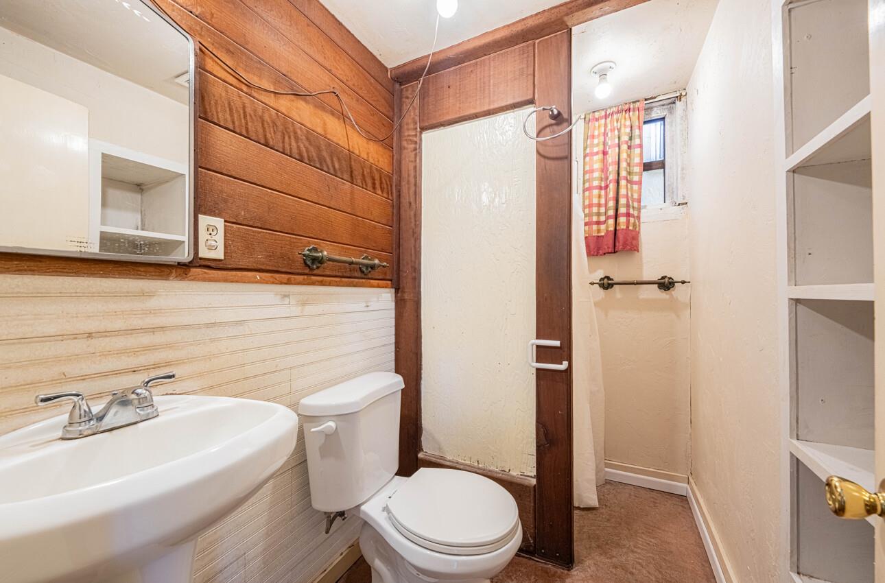 1800 Luxton Street Seaside, CA 93955 - Photo 39 of 48 a bathroom with a sink a toilet and shower