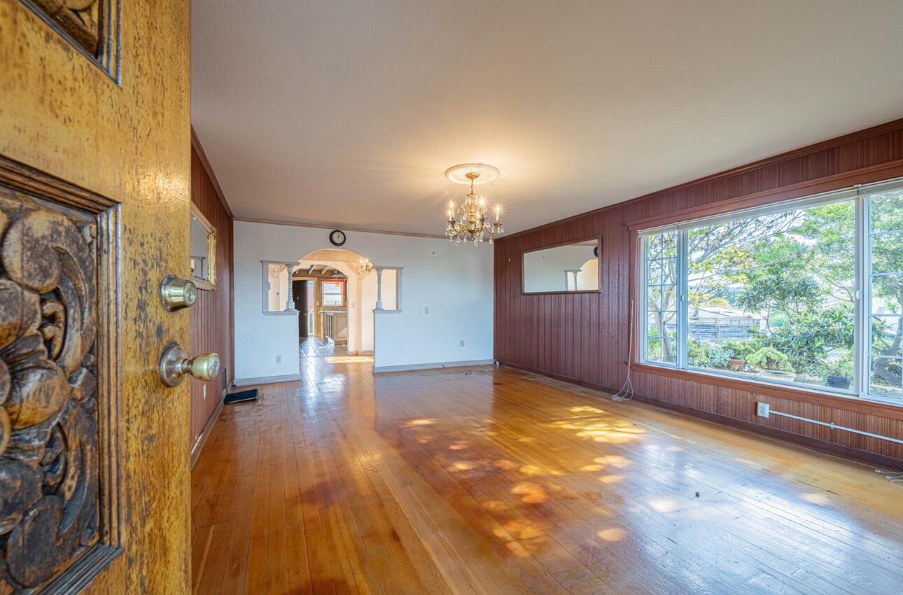 1800 Luxton Street Seaside, CA 93955 - Photo 6 of 48 a view of a room with window and wooden floor