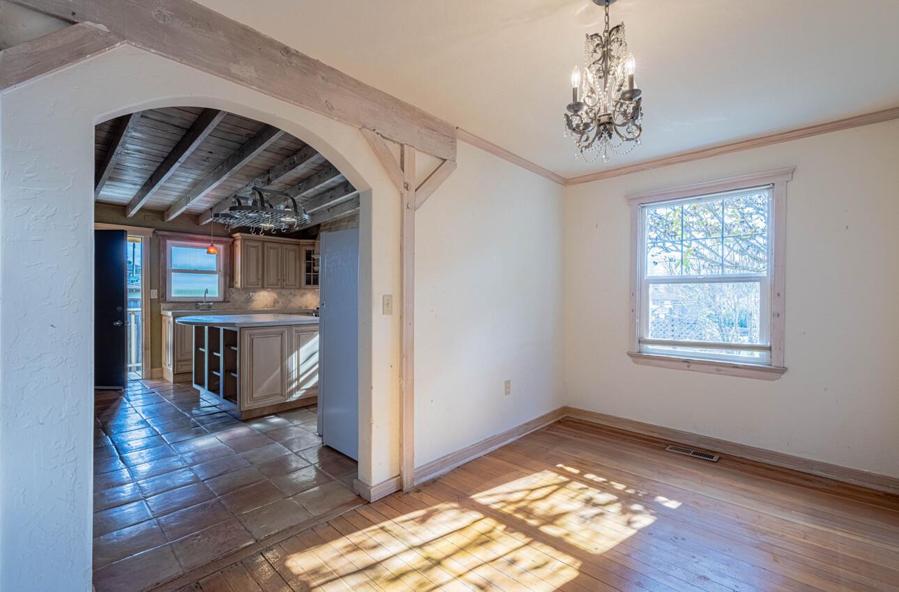 1800 Luxton Street Seaside, CA 93955 - Photo 9 of 48 a view of empty room with wooden floor and fan