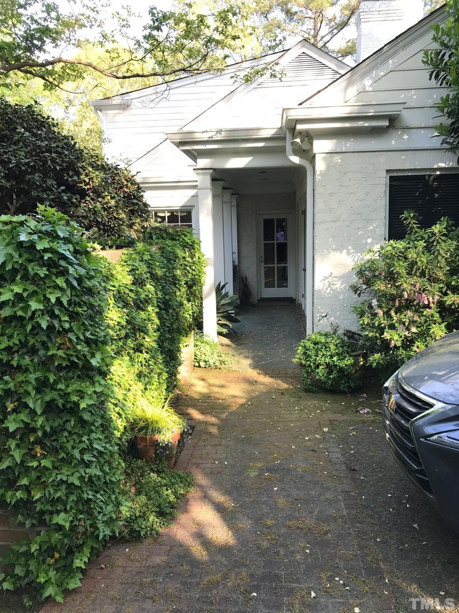 608 Scotland Street Raleigh, NC 27609 - Photo 2 of 3 a front view of a house with garden