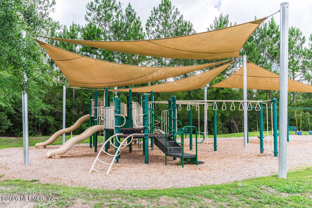 75394 Bridgewater Drive Yulee, FL 32097 - Photo 26 of 55 a view of a park with a slide