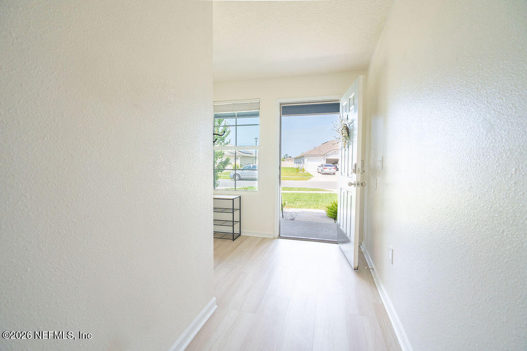 75394 Bridgewater Drive Yulee, FL 32097 - Photo 42 of 55 a view of a room with window and front door