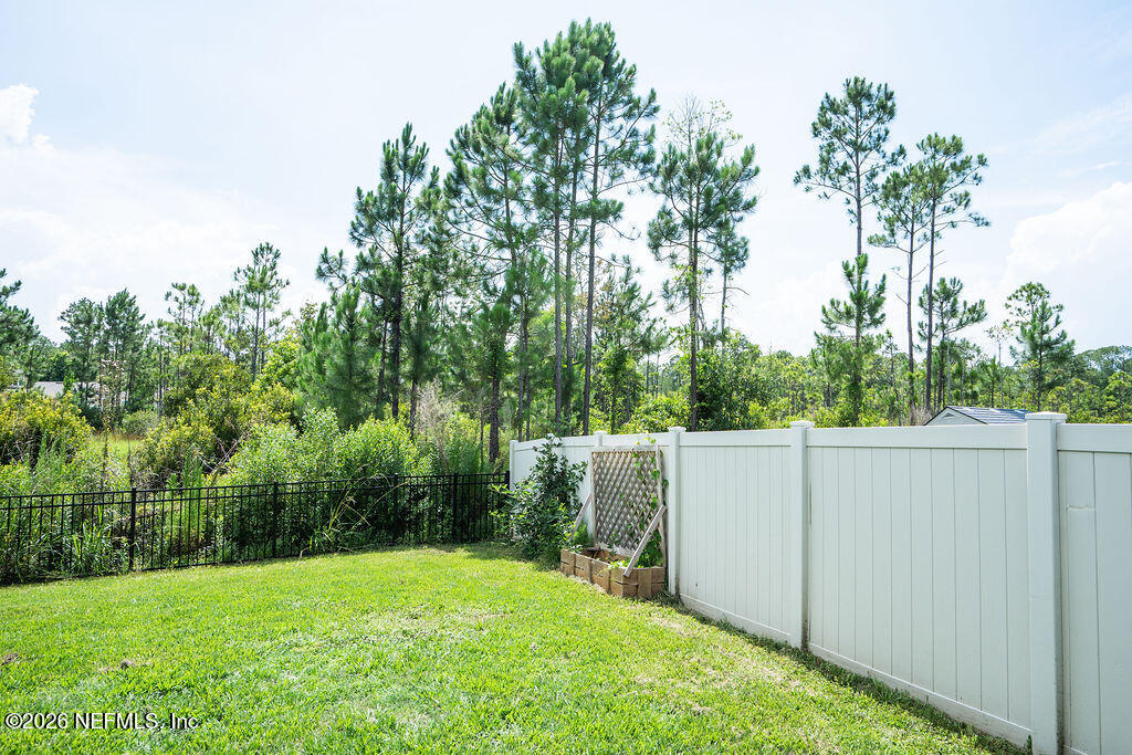 75394 Bridgewater Drive Yulee, FL 32097 - Photo 52 of 55 a view of an outdoor space with a lake view