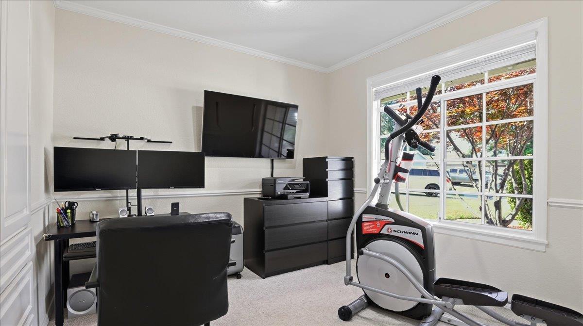 2162 Stratton Place San Jose, CA 95131 - Photo 8 of 12 a work room with furniture and a flat screen tv