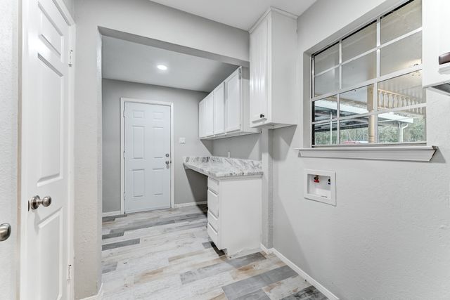 a room with a washer and dryer