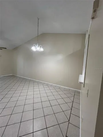 a kitchen with a stove a sink and a refrigerator