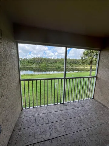 a view of a balcony with lake
