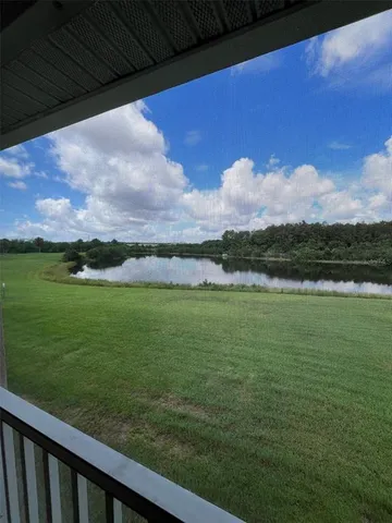 a view of a lake from a balcony