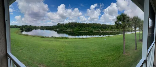 a view of outdoor space with garden and trees