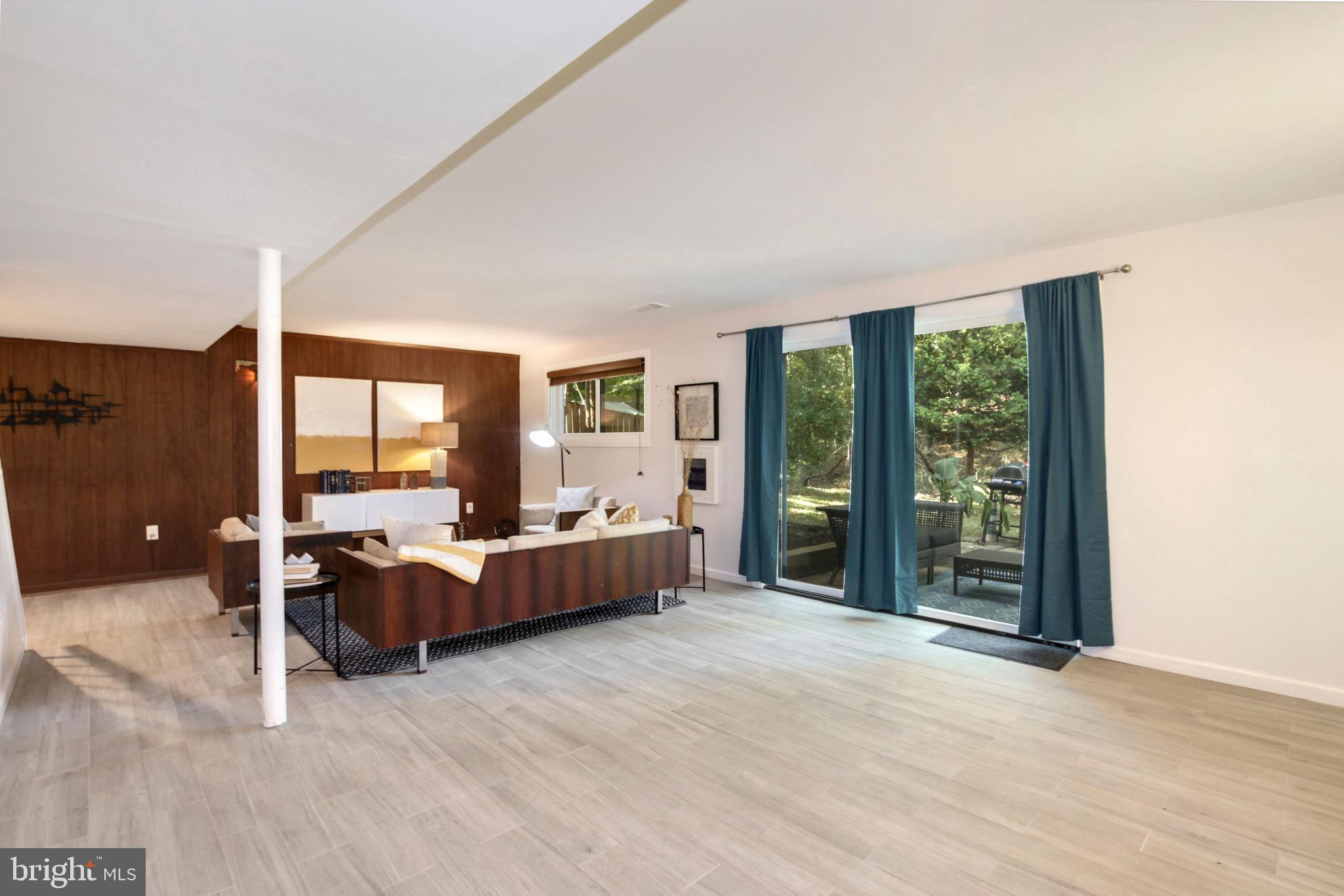 11207 Lombardy Road Silver Spring, MD 20901 - Photo 23 of 32 Lower Level Family Room with Sliding Glass Doors