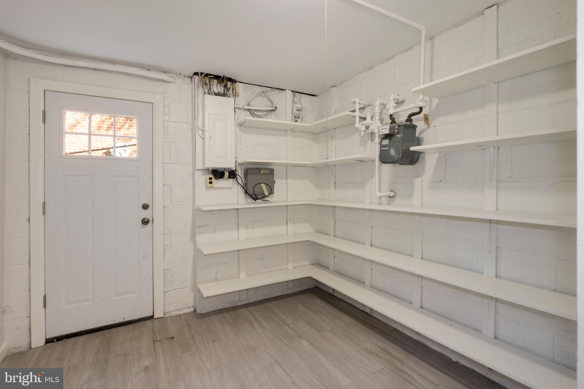 11207 Lombardy Road Silver Spring, MD 20901 - Photo 29 of 32 Storage Area with New Furnace and Exit Door