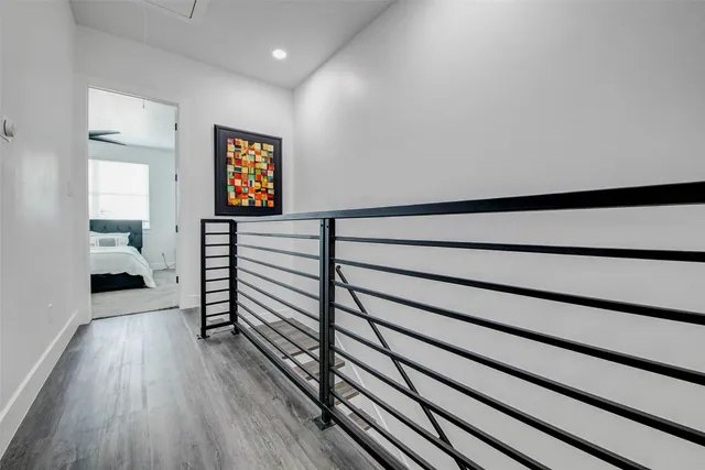 a view of a balcony with two chairs