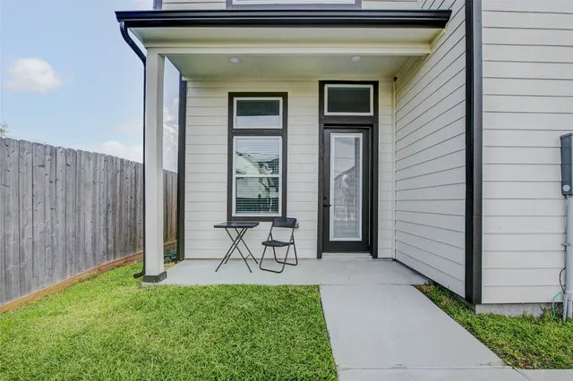 a view of a backyard with a garden