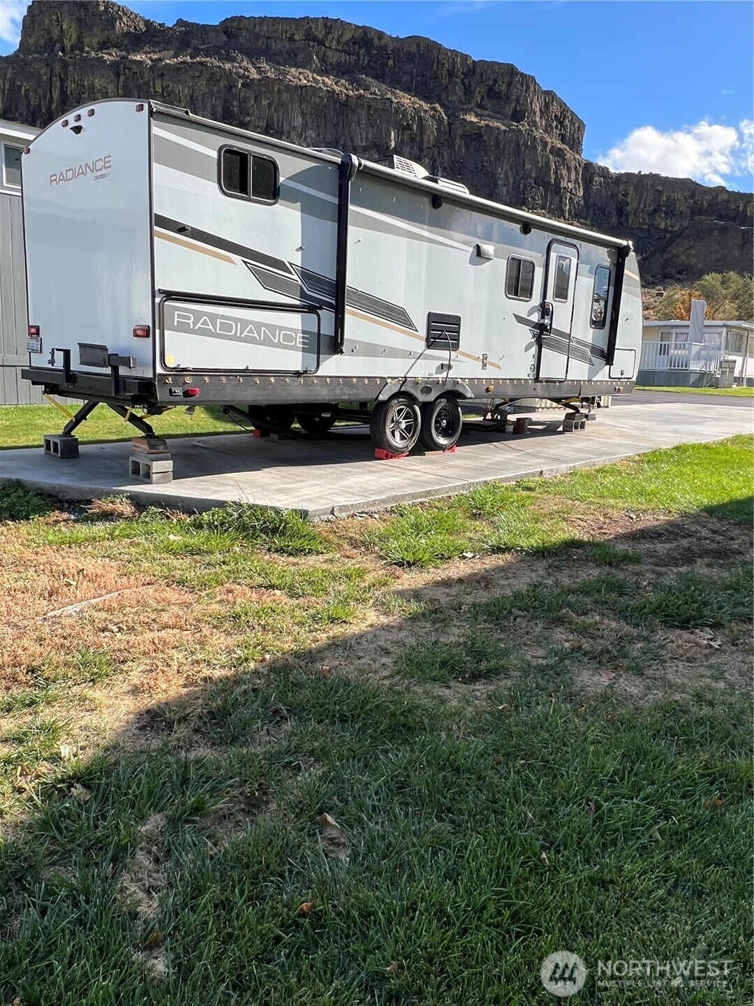 31465 Moore Road Northeast, Unit 616 Coulee City, WA 99115 - Photo 12 of 19 a view of a house with backyard and sitting area
