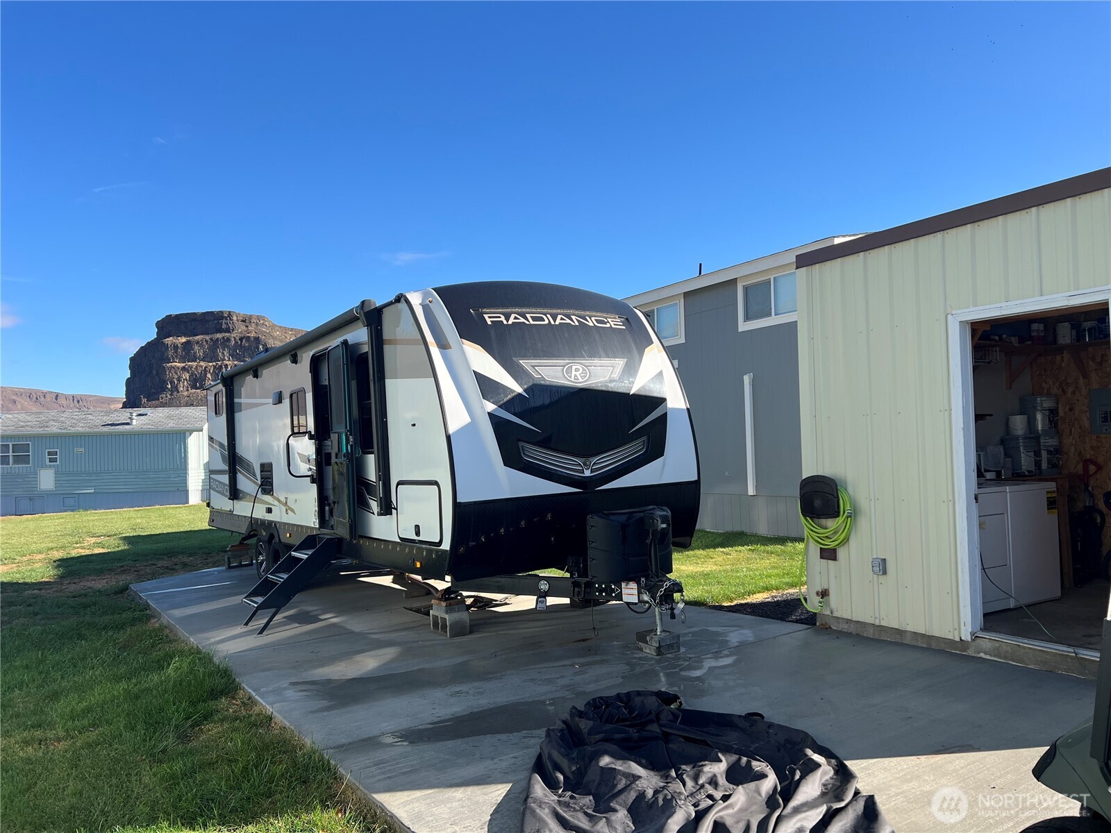 31465 Moore Road Northeast, Unit 616 Coulee City, WA 99115 - Photo 15 of 19 a view of a house with a swimming pool